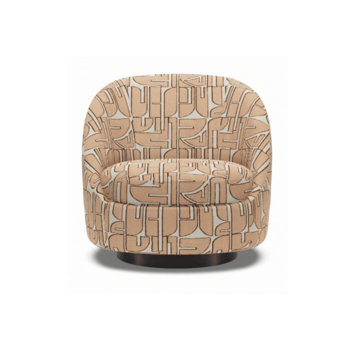 Rounded custom chair in a warm orange geometric fabric