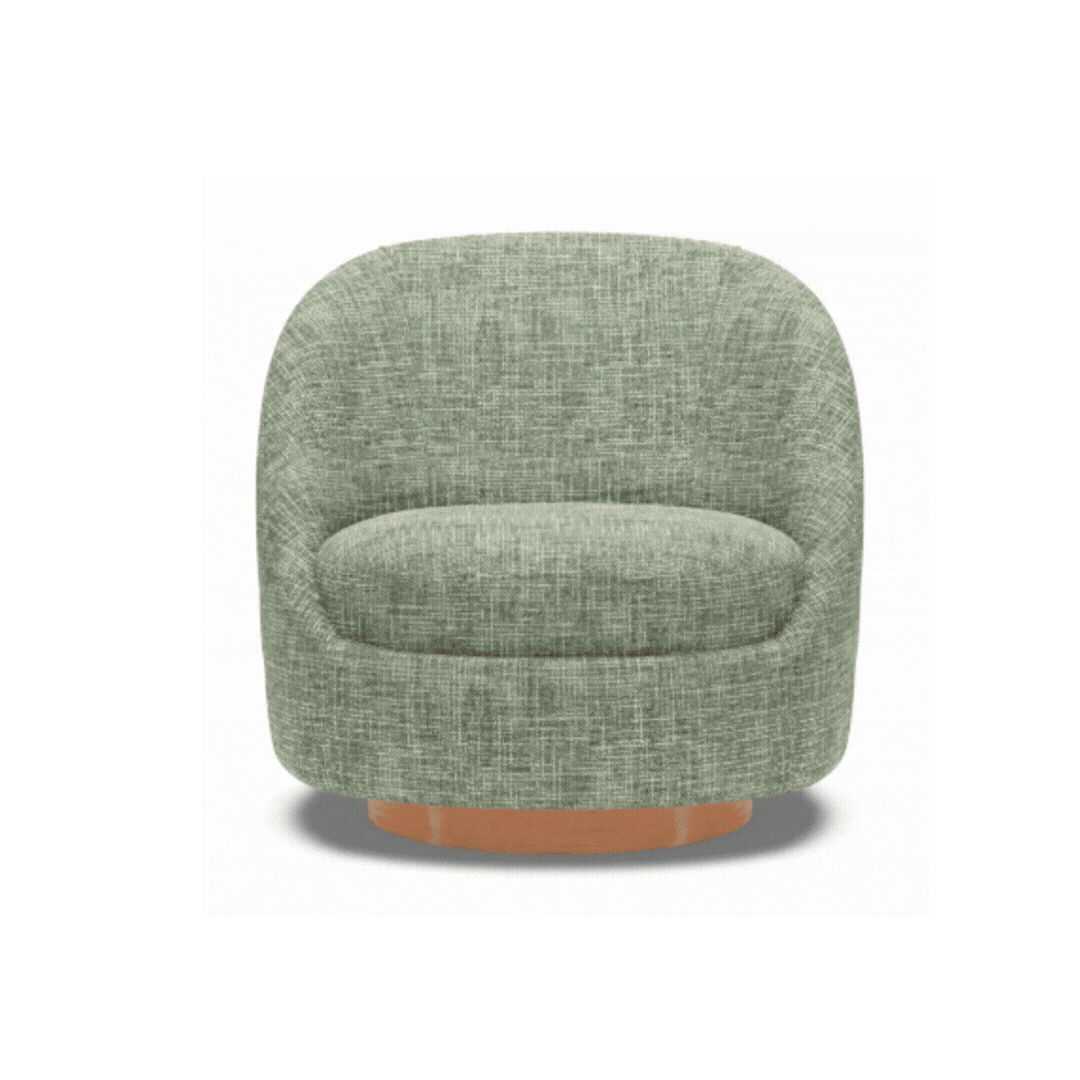 Rounded custom chair in a soft green textured fabric