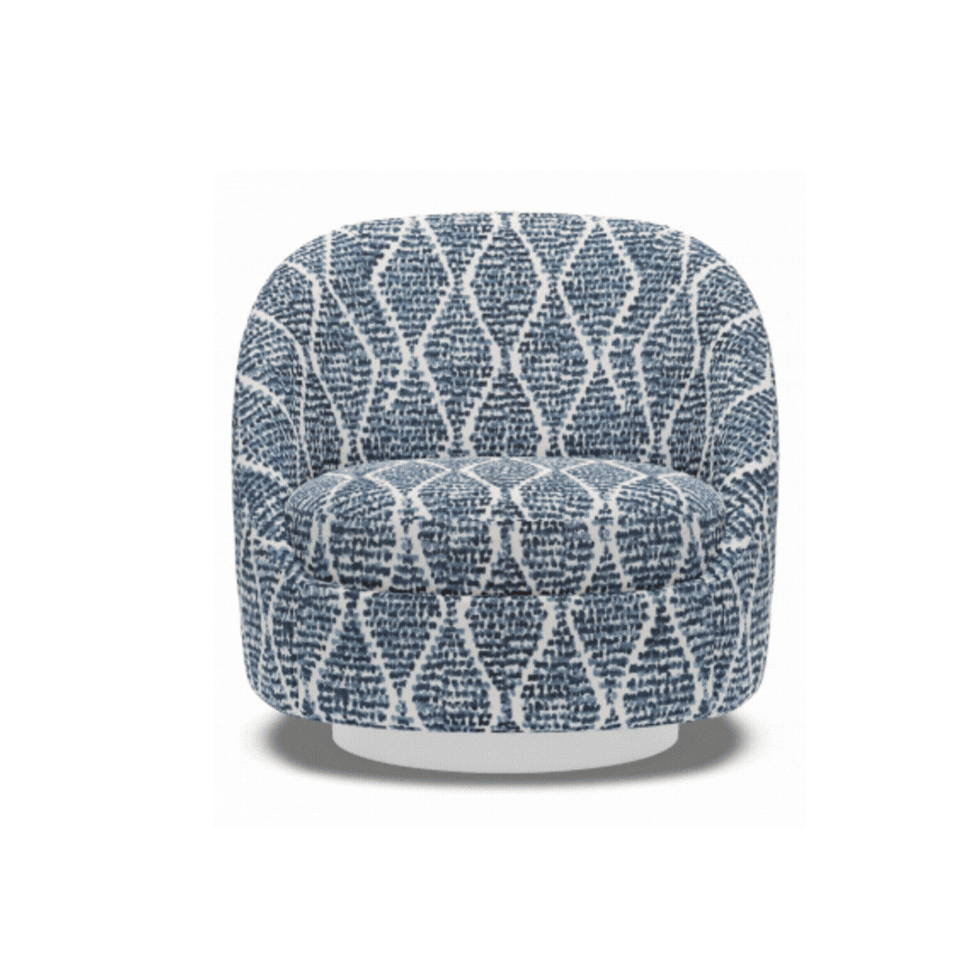 Rounded custom chair in a dark blue diamond-patterned fabric