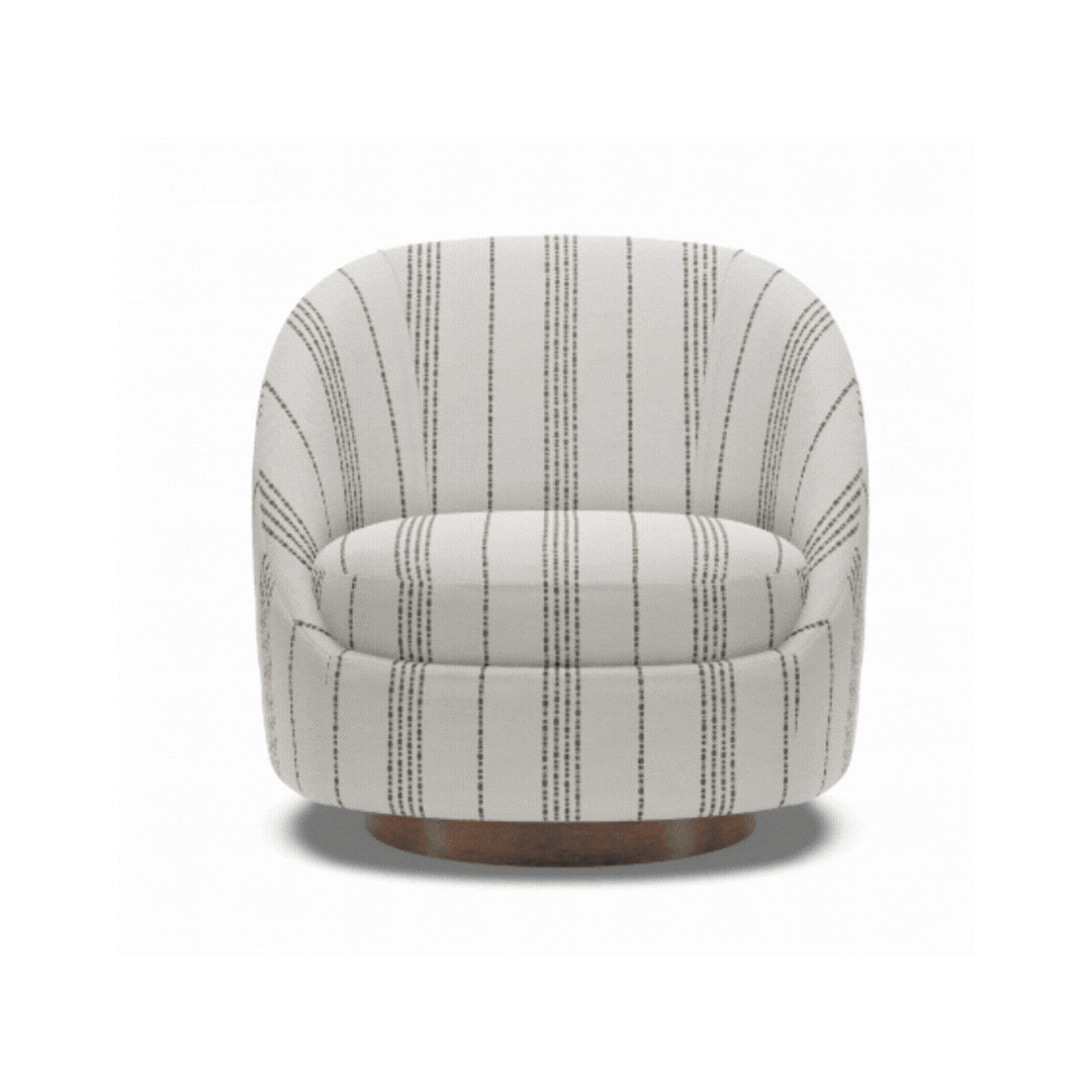 Rounded custom chair in a neutral striped fabric